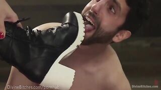 The muscled dominatrix beats and dominates her slaveboy in a hardcore scene