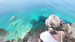 The cute girlfriend passionately sucks dick on the ocean shore