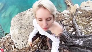 The cute girlfriend passionately sucks dick on the ocean shore
