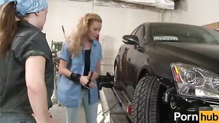 The girl is having fun with her girlfriend in the garage