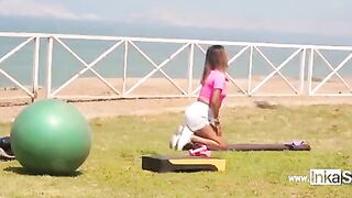 Peruvian woman doing exercises in the gym, captured in a compromising pose