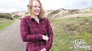Exhibitionist beauty almost gets caught while masturbating on the public beach