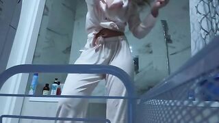 A girl caresses her pussy in the bathroom, no one will see it