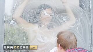 Ruby Sims rubs her body against the window cleaner