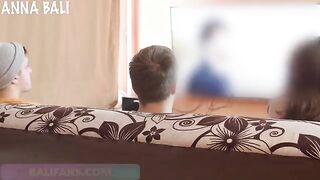 A girl almost got caught on the couch while kissing a friend