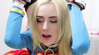 Candy White, aka Supergirl, in solo bondage action, showcasing her slim 5'5" frame and natural 32A curves