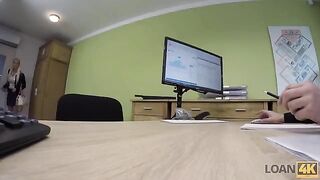 A business lady in need is trying to get a loan from the bank