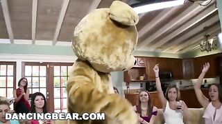 Bunch of bitches get fucked by a crowd of guys in an orgy scene