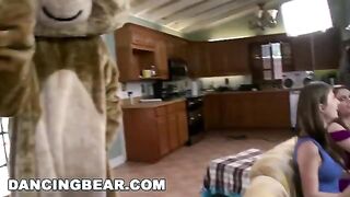 Bunch of bitches get fucked by a crowd of guys in an orgy scene