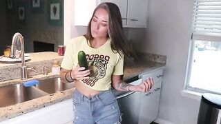 The girl got herself ready for lunch in the kitchen