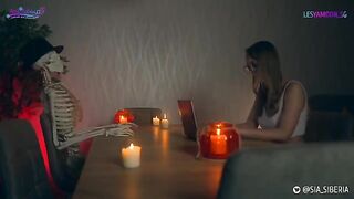 A girl is fucking with her girlfriend in a Halloween costume