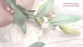 Bukkake and blowing while the girl is putting flowers in her ass