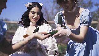 A group of cute girls, including Riley and Lena, are having a threesome in the park