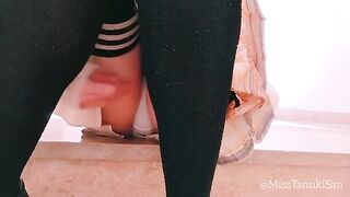 A naughty schoolgirl removes her panties and indulges in solo pleasure at her desk