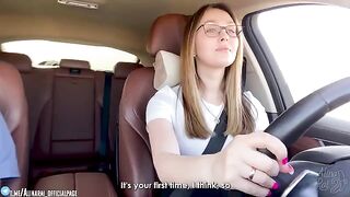 A young guy is having fun with his stepmom in the car after driving lessons