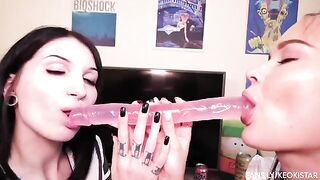 Two girls are having fun with a double dildo in their pussy