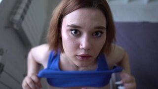A sexy girl with red hair spits on the guy’s dick and fucks him