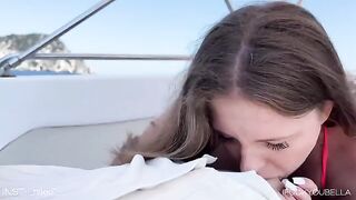 A girl is having fun with the friend of her boyfriend on a yacht