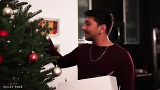 Young couple enjoy Christmas surprise with breast sex