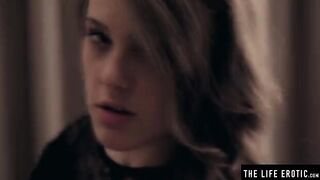 The beautiful woman plays with milk on her huge boobs