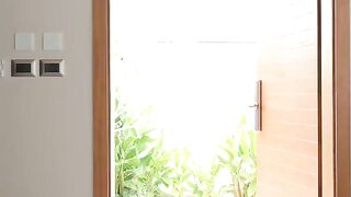 A hot girl is training with her coach in intimate skills on a villa