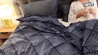 A hot stepmom is sharing a bed with her stepson