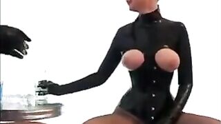 Lesbians in latex tried to satisfy their intense desire