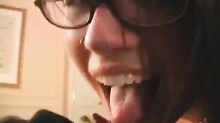 The fool is happy in glasses, he was allowed to lick the guy's dick