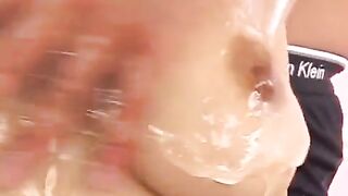 Oily handjob with a Japanese girl with huge boobs