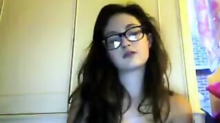 A student with glasses gets naked on webcam