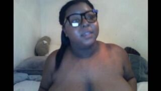 The black woman closed the camera with her big natural breasts