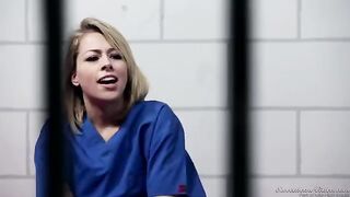 Two girls licking each other in the prison cell