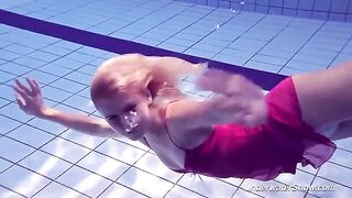 Babe Helen takes a swim in the pool without a bathing suit