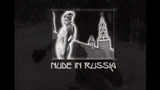 Nude girls are having fun with snowballs on the street during the winter