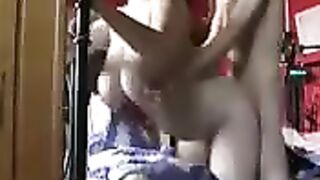 A busty woman fucks in her ass at home with her husband