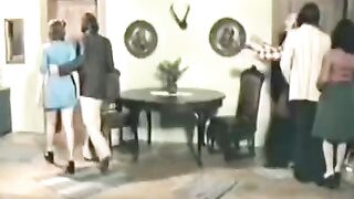 Retro sex with a delightful brunette and her friends on the bed