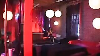 Black woman in latex suit rides with passion