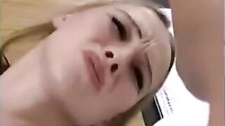 The sexy blonde has sex with two guys at once and gets fisted