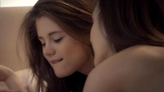 Two beauties are having a good time licking each other’s pussies on the bed