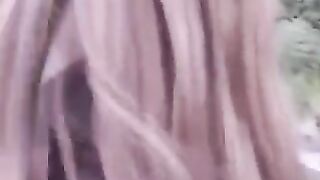 A girl is not embarrassed to lick a cock in public places
