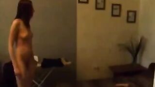 A beautiful Russian woman caresses herself in the kitchen and cums
