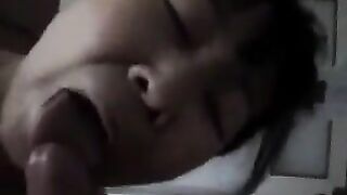 An adult Chinese woman practices her blowjob skills on him in a steamy scene