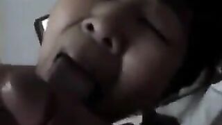 An adult Chinese woman practices her blowjob skills on him in a steamy scene