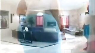 A fat black woman has sex with her partner on the couch