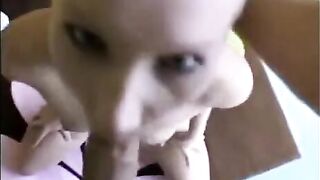 Girl passionately sucks the cock of her boyfriend in a deep blowjob