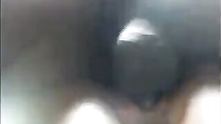 A black-skinned girl caresses herself and squirts from her pussy