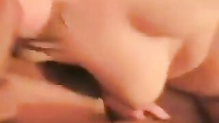 A girl spreads her legs to show everyone her naked pussy with a protruding clitoris