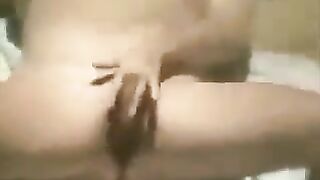 A girl masturbates on the beach with a hidden camera