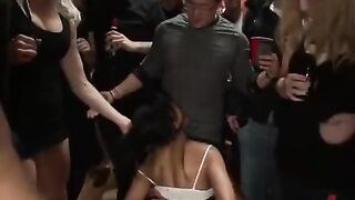 A mature woman in rough bondage gets fucked by several guys, showcasing intense interracial action