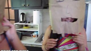 The girls wear bags on their heads and have sex